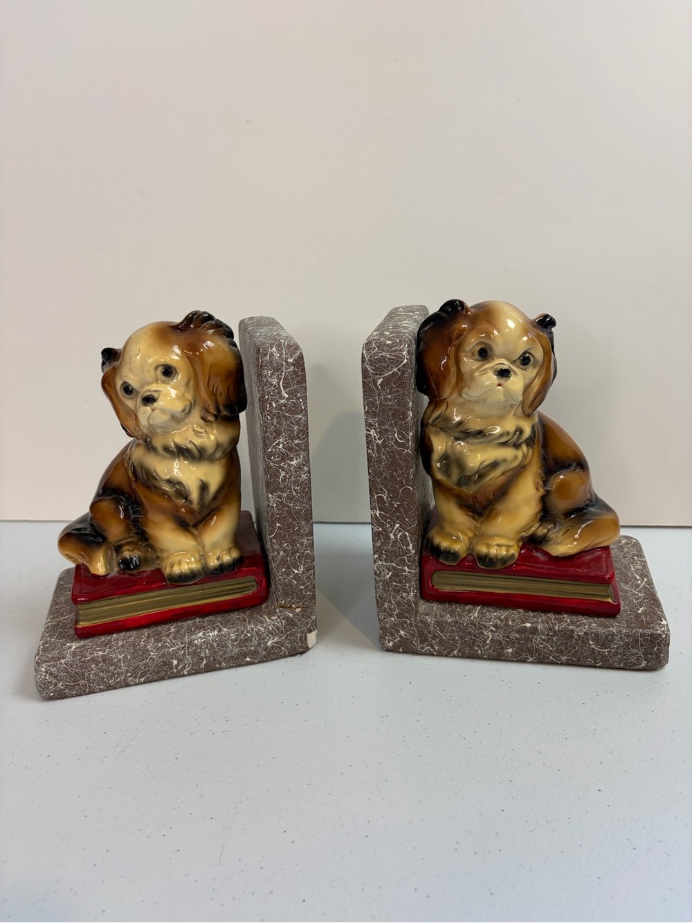 Vintage 1960s Glazed Ceramic Dog Bookends Pair Granite? Base mcm Pekingese dogs